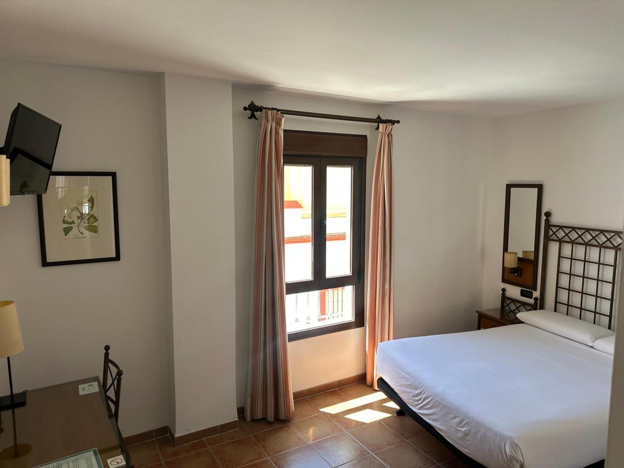 Hotel Hacienda Santa Barbara Castilleja de la Cuesta Zimmer foto